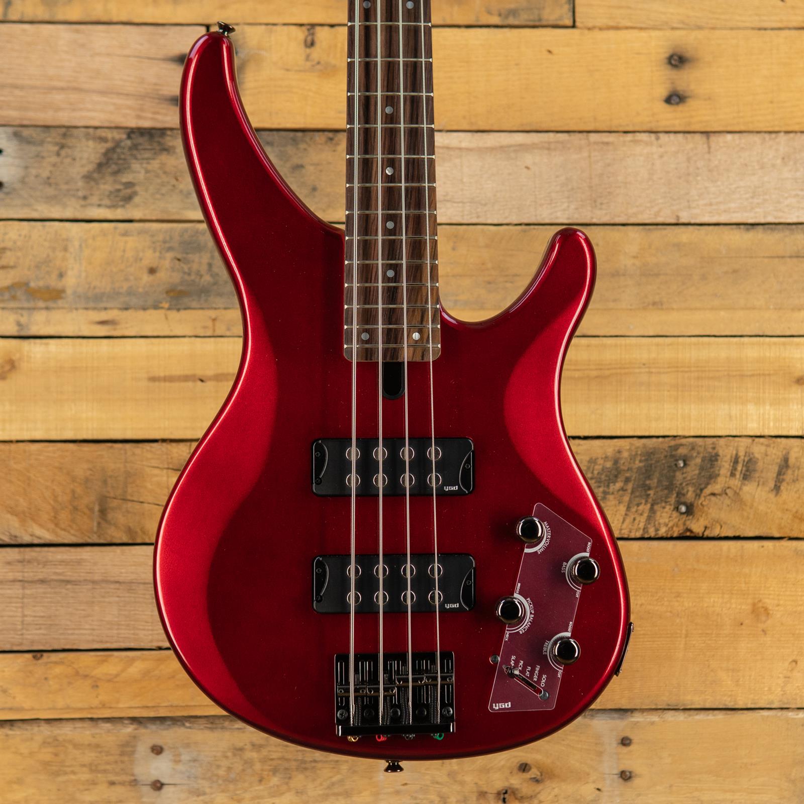 Yamaha TRBX304CAR 4-string; solid mahogany body, 5-piece maple/rosewood neck, rosewood fingerboard, M5 humbucking pickups, 2-band EQ,Performance EQ switch; Candy Apple Red
